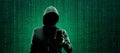 Wanted Hacker is Coding Virus Ransomware Using Abstract Binary Code. Cyberattack, System Breaking and Malware Concept. Royalty Free Stock Photo