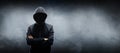 Wanted Hacker is Coding Virus Ransomware Using Abstract Binary Code. Cyberattack, System Breaking and Malware Concept. Royalty Free Stock Photo