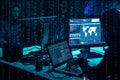 Wanted hackers coding virus ransomware using laptops and computers. Cyber attack, system breaking and malware concept.