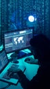 Wanted hackers coding virus ransomware using laptops and computers. Cyber attack, system breaking and malware concept.