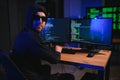 Wanted hackers coding virus ransomware using laptops and computers. Cyber attack, system breaking and malware concept Royalty Free Stock Photo