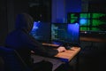 Wanted hackers coding virus ransomware using laptops and computers. Cyber attack, system breaking and malware concept Royalty Free Stock Photo