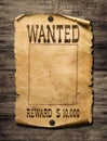 Wanted wild west poster on wood background Royalty Free Stock Photo