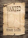 Wanted wild west poster on wood background Royalty Free Stock Photo