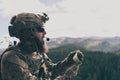 War concept. Bearded soldier in uniform of special forces in dangerous military action in dangerous enemy area studies Royalty Free Stock Photo