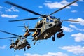 War Machines in Flight, Combat Helicopters Against a Vivid Sky