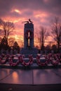 war memorial with wreaths and candles at dusk