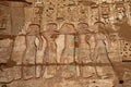 War prisoners scene carved on walls of temple of Ramsess ||| at Medinet habu on the west bank of Luxor, Egypt Royalty Free Stock Photo