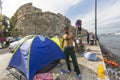 War refugee near the tents. Kos island is located just 4 kilometers from the Turkish coast Royalty Free Stock Photo