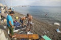 War refugees wash up on the beach. Many refugees come from Turkey in an inflatable boats Royalty Free Stock Photo