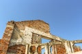 War-torn building shelled and riddled with bullet holes