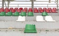 War in Ukraine. Broken plastic benches for fans on the podium, in a destroyed football stadium in a children's