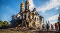 War in Ukraine, burned cathedral, people stay on ruins.