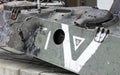 War in Ukraine. Destroyed tank with a torn off turret with a V on it. Broken and burned Russian tanks. Designation sign or symbol