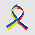 War in Ukraine. Flag of Ukraine. Flag of Russia. Awareness ribbon in colos of ukrainian and russian flags isolated