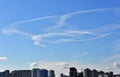 War Ukraine Russia. Contrails of an unknown aircraft in the sky over the capital