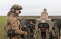 War in Ukraine. Ukrainian Armed Forces artillerymen in combat position