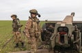 War in Ukraine. Ukrainian Armed Forces artillerymen in combat position