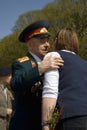 War veteran man portrait. He embraces a woman. Royalty Free Stock Photo