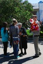 A war veteran woman receives flowers. Royalty Free Stock Photo