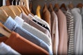 Wardrobe closet with different stylish clothes, closeup Royalty Free Stock Photo