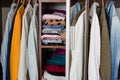 Wardrobe closet with different stylish clothes, home Royalty Free Stock Photo