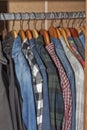 Wardrobe closet full of clothes