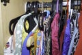 Wardrobe overflowing and colorfully mixed with jackets and pants, sweaters Royalty Free Stock Photo