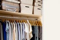 Wardrobe with perfect order clothes shades. Copy space Royalty Free Stock Photo