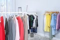 Wardrobe racks with different stylish clothes