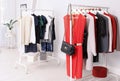 Wardrobe racks with different stylish clothes