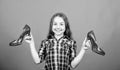 wardrobe research. beauty and fashion. shoe shop and repair. shoe maker. happy childhood. small girl with stylish shoes Royalty Free Stock Photo