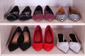 Wardrobe shelves with different shoes