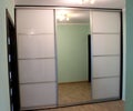 Wardrobe with sliding doors. Furniture. Royalty Free Stock Photo