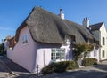 Pink thatched cottage in Wareham, Dorset on September 18, 2022 Royalty Free Stock Photo