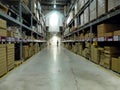 Warehouse aisle with boxed articles