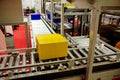 Warehouse automation. Automated conveyor lines with robotic manipulator Royalty Free Stock Photo