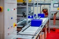 Warehouse automation. Automated conveyor lines with robotic manipulator Royalty Free Stock Photo