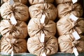 Warehouse concept. Stacked paper sacks in a warehouse