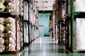 Warehouse concept. Stacked paper sacks in a warehouse