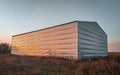 Warehouse constructed of corrugated galvanized iron. Royalty Free Stock Photo