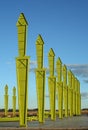 Steel girder shed construction with blue sky background in industrial field.