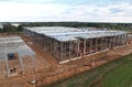 Warehouse Construction from metal structure. Steel Structure Warehouse Building on light gauge steel framing. Aerial view of