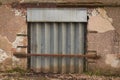 Abandoned old Warehouse with steel shutter doorway Royalty Free Stock Photo