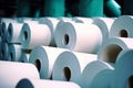 Warehouse for finished products of a paper mill. Large rolls of paper in the workshop. Production of paper and cardboard