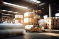 Warehouse for finished products of a paper mill. Large rolls of paper in the workshop. Production of paper and cardboard