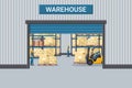 Warehouse with industrial metal racks and shelves for pallet support. Worker driving a forklift. Forklift driving safety. Cargo