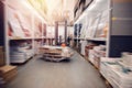 Warehouse industrial premises for storing materials and wood, forklift. Concept logistics, transport. Motion blur effect