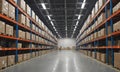 warehouse interior features rows blue and orange shelving units, with cardboard boxes neatly arranged on the Royalty Free Stock Photo