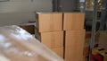Warehouse interior, packing boxes stacking. rack stack Arrangement of cardboard boxes in a store warehouse. Cardboard Royalty Free Stock Photo